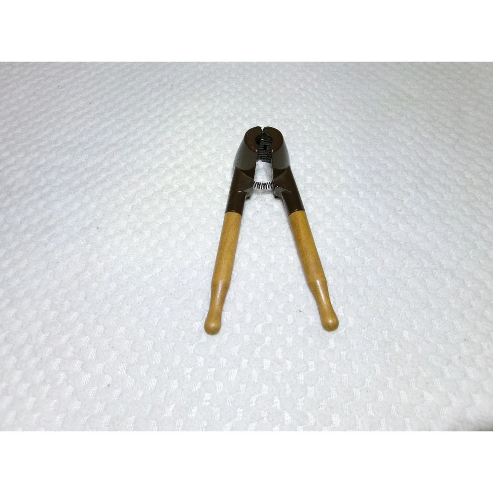 Vintage Spring Loaded Nutcracker‎ Brown Metal with Wood Handles Conical Design